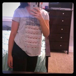 V neck red white and blue tee.